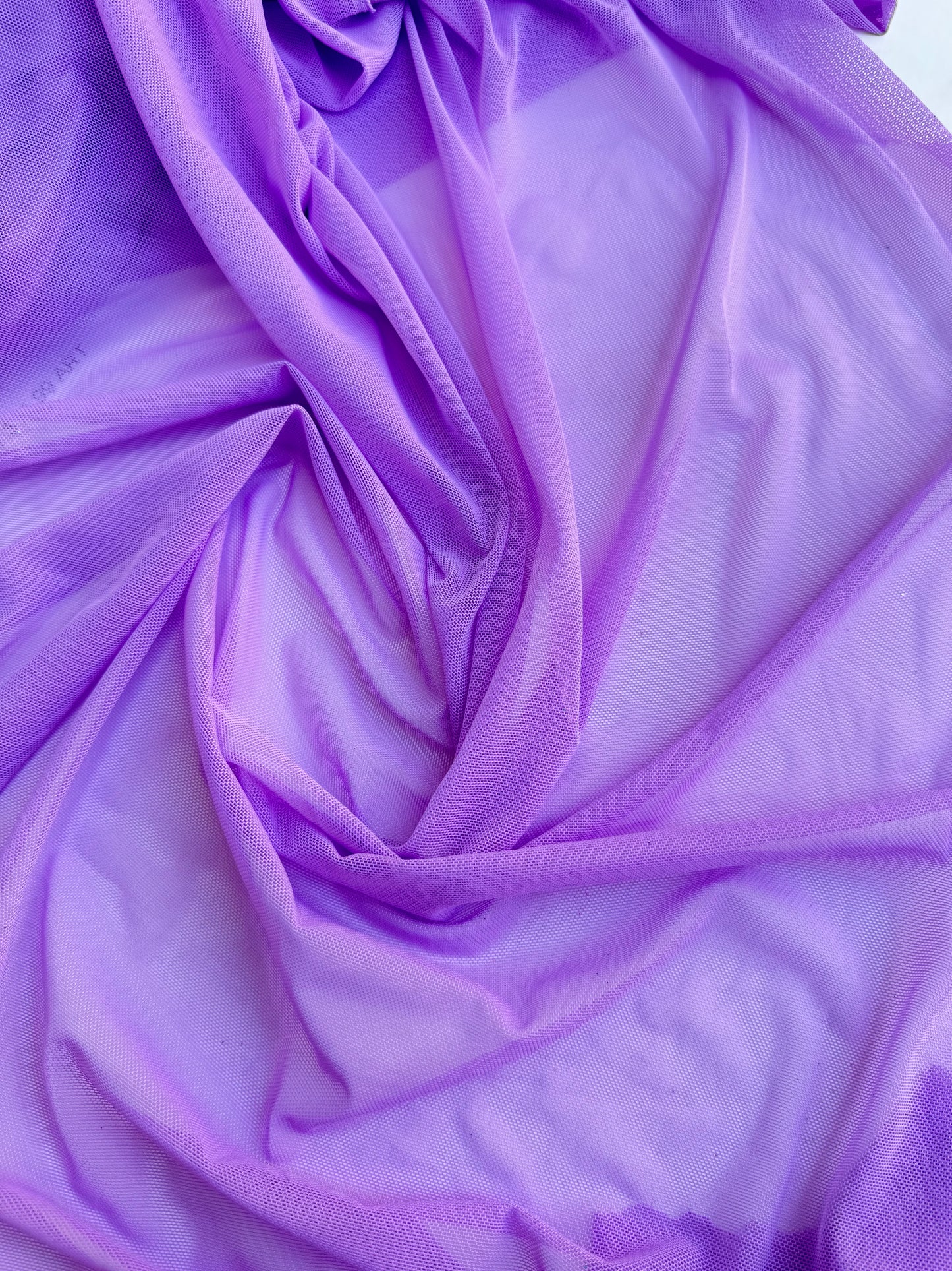 Purple power mesh fabric sold by the yard