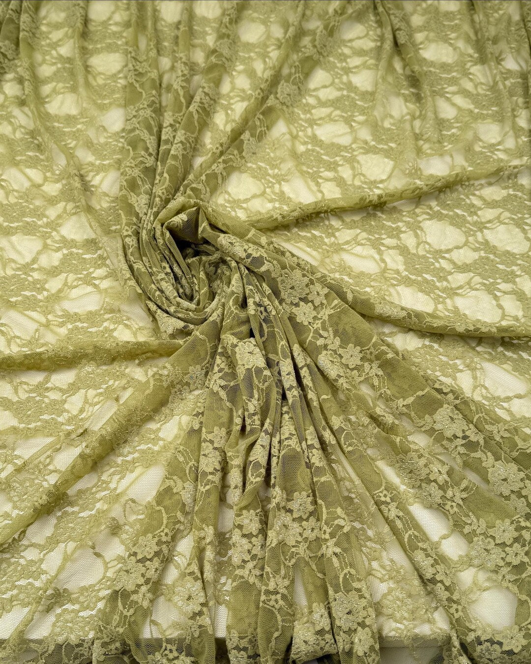 Olive moss green floral stretch lace fabric draped showing texture comparison