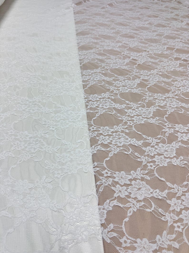 Ivory Floral Stretch Lace Fabric two sections showing dense and open floral pattern