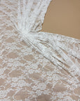 Ivory Floral Stretch Lace Fabric bright draped showing intricate design