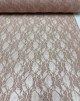 Nude Floral Stretch Lace Fabric close up intricately woven floral surface texture