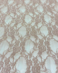 Close up Nude Floral Stretch Lace Fabric interconnected floral motifs elegant detail