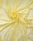 Butter Yellow Floral Stretch Lace in soft folds showing sheer quality