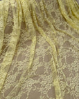 Butter Yellow Floral Lace Fabric close up showing floral and leaf pattern detail