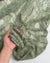 Sage Green Floral Stretch Lace Fabric sheer draped with intricate floral details