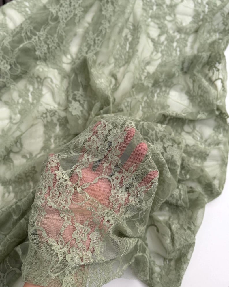 Sage Green Floral Stretch Lace Fabric close up texture and flexibility