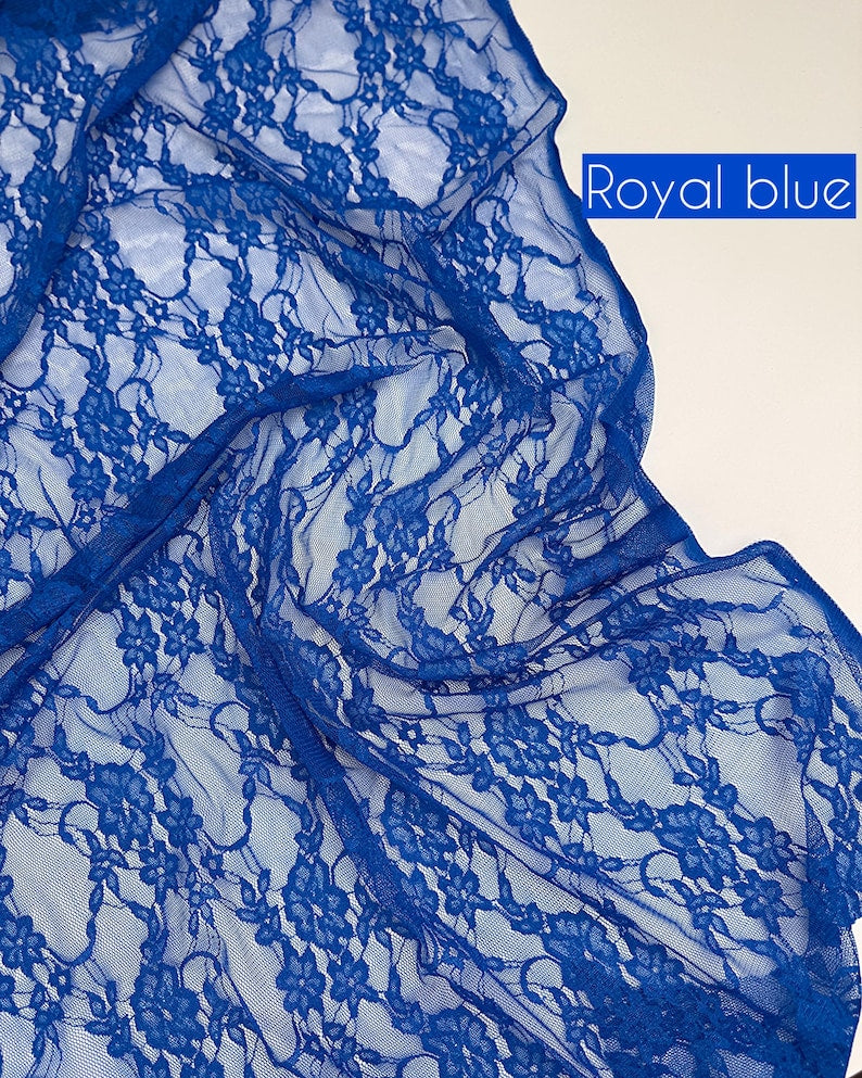 Royal Blue Floral Stretch Lace Fabric draped sheer with Royal Blue label