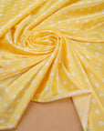Banana yellow polka dot satin gathered to show drape