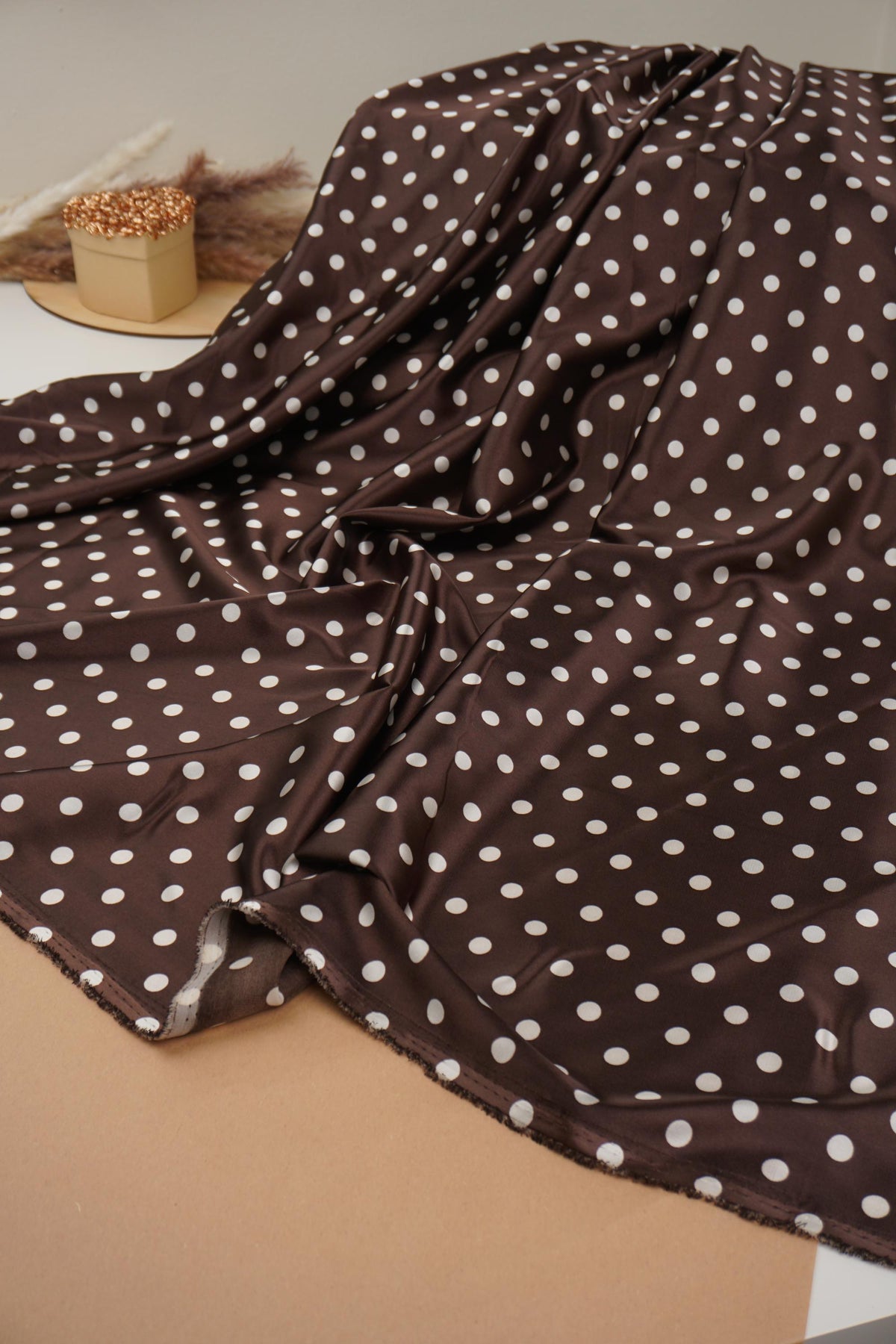 Soft lightweight chocolate brown polka dot fabric with fluid drape